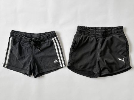 2x Kinder-Turnhosen/-Tights kurz (Adidas+Puma / Gr.128+140)
