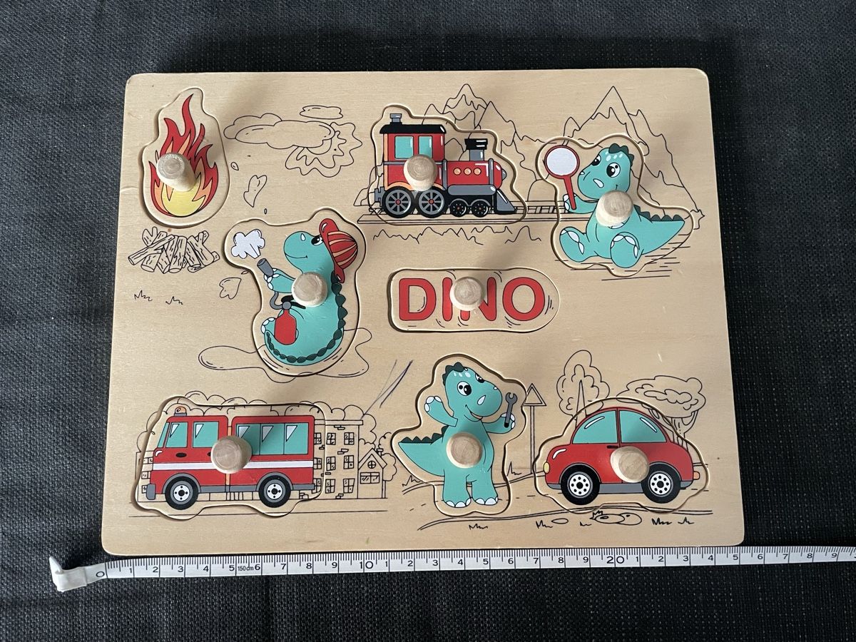 Spielzeuge: Dino Steckpuzzle aus Holz – Gebraucht aus luzern von plueschmors.