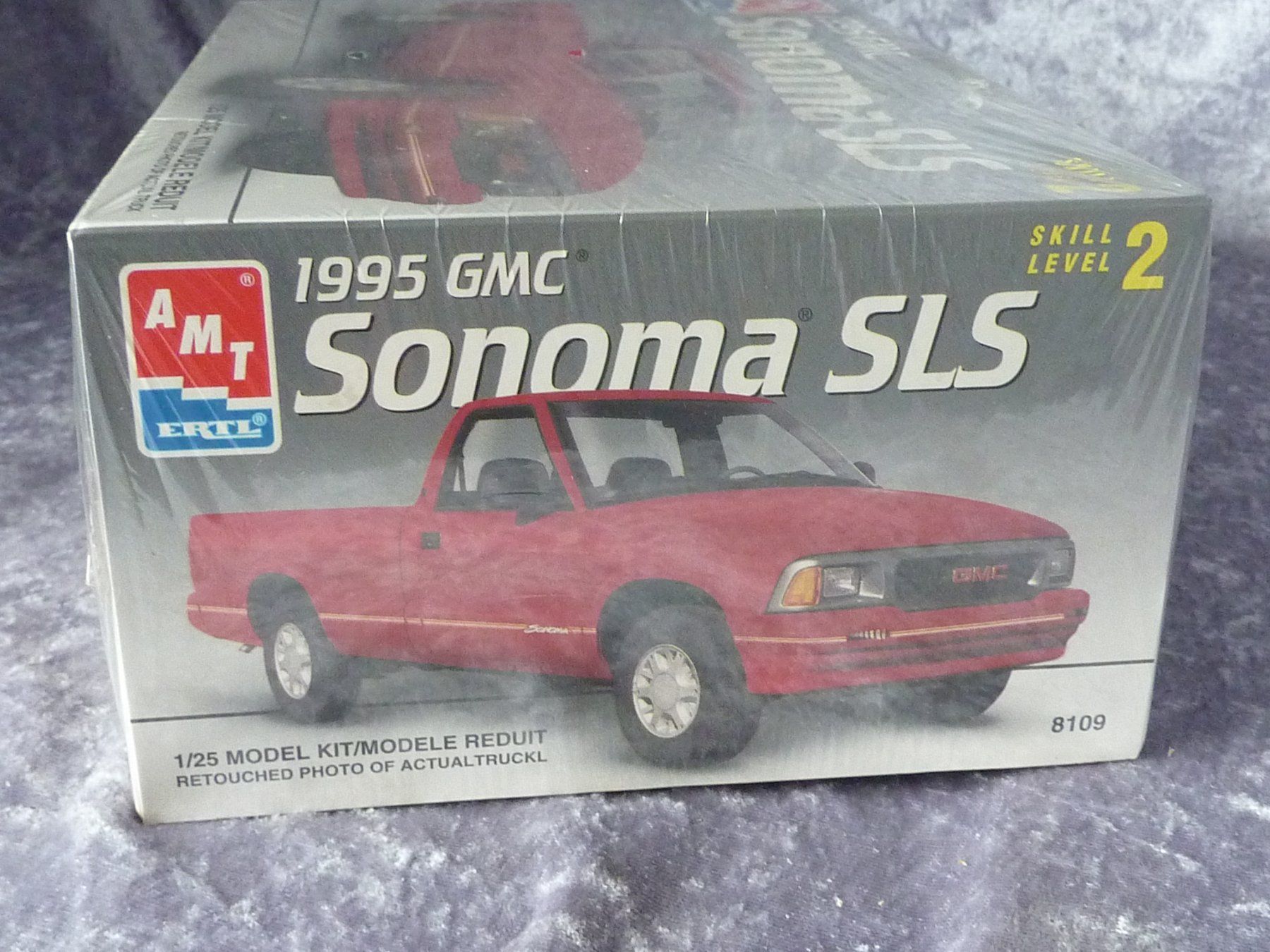 AMT/ERTL Modellautos: GMC Sonoma SLS 1995  1:24 – Neu und originalverpackt aus Dürrenäsch von modellautos4you 2