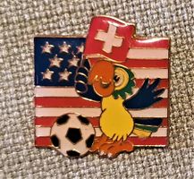 H654 Pin Schweiz USA Rediffusion Papagei
