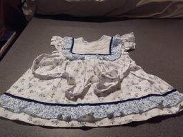 Röckli ca. Grösse 62, weiss/blaues Muste