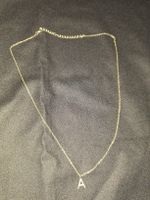 Collier doré avec pendentif lettre A - Élégant et discret
