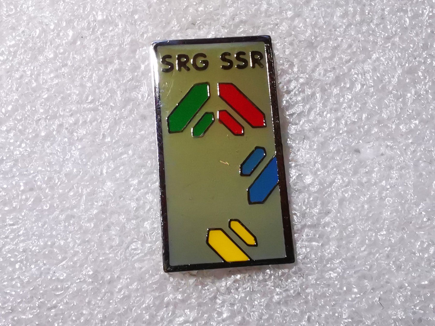 Placchette & Badge: Ansteckpin 53: SRG SSR – Usato da Oppligen venduto da Pin-Fall-Shop