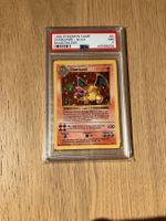 1999 POKEMON BASE CHARIZARD - HOLO SHADOWLESS PSA 7