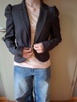 Blazer élégant avec manches bouffantes