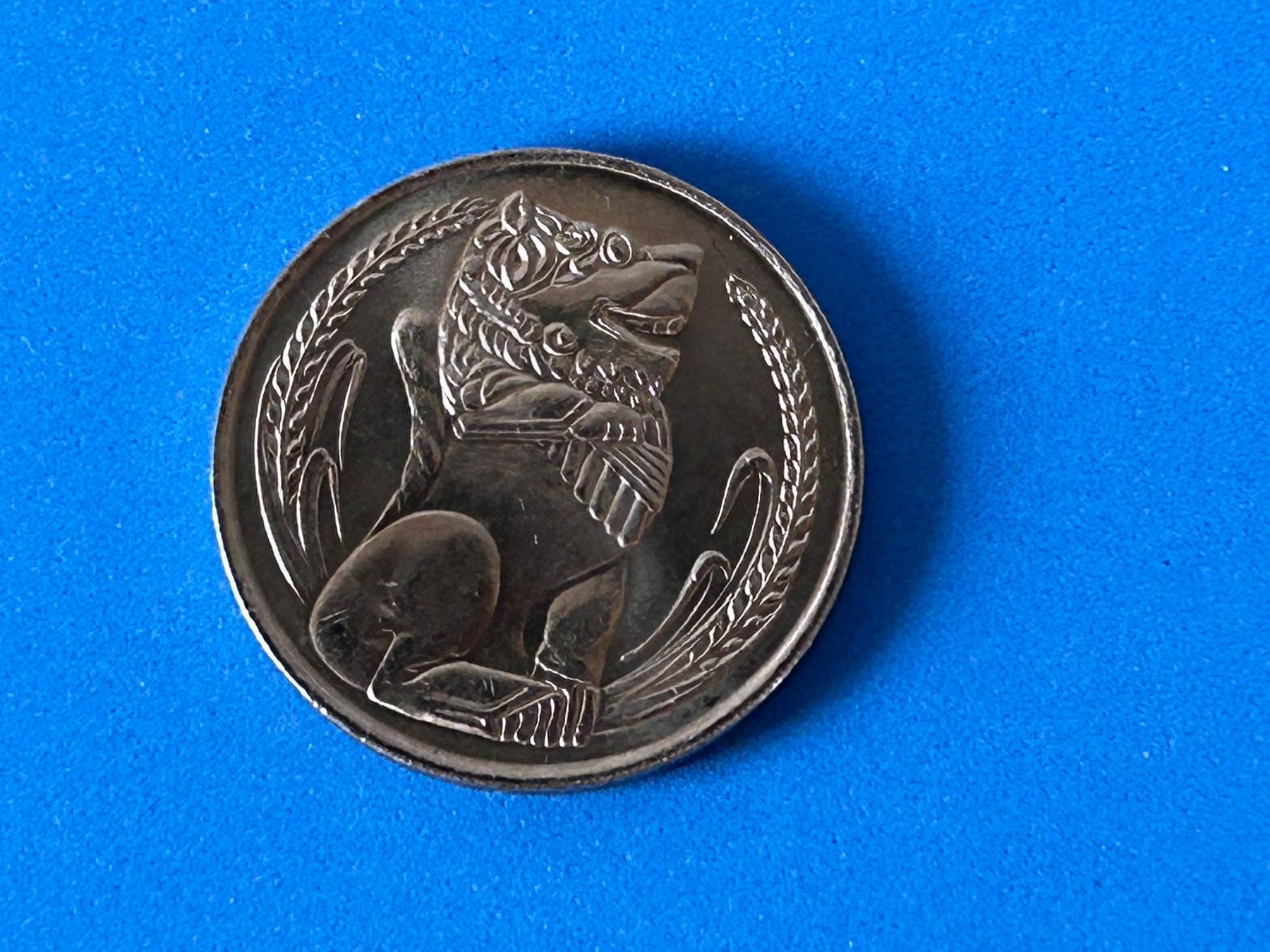 Tutti le monete: Singapore - 1 Dollar 1982 – Usato da Corcelles NE venduto da AJKader 7