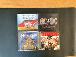 CD-Sammlung – AC/DC, Manowar, Skorpions
