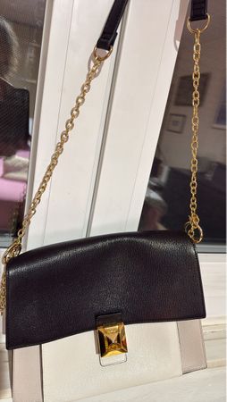Stylish Black and White FURLA Leather Handbag with Gold Clas