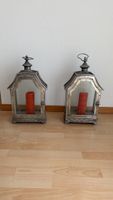 Two Decorative Metal Lanterns with Glass Panes Set