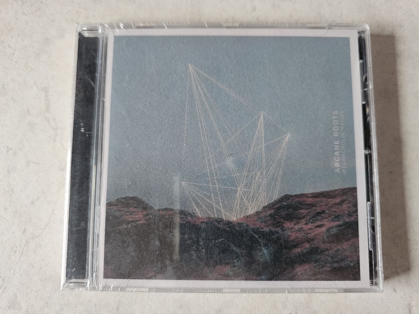 CDs: Arcane Roots  -  Melancholia Hymns / Fabrikneu – Neu und originalverpackt aus Schneisingen von backstore24
