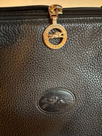 Sac Longchamp "Le Foulonné" en cuir noir.