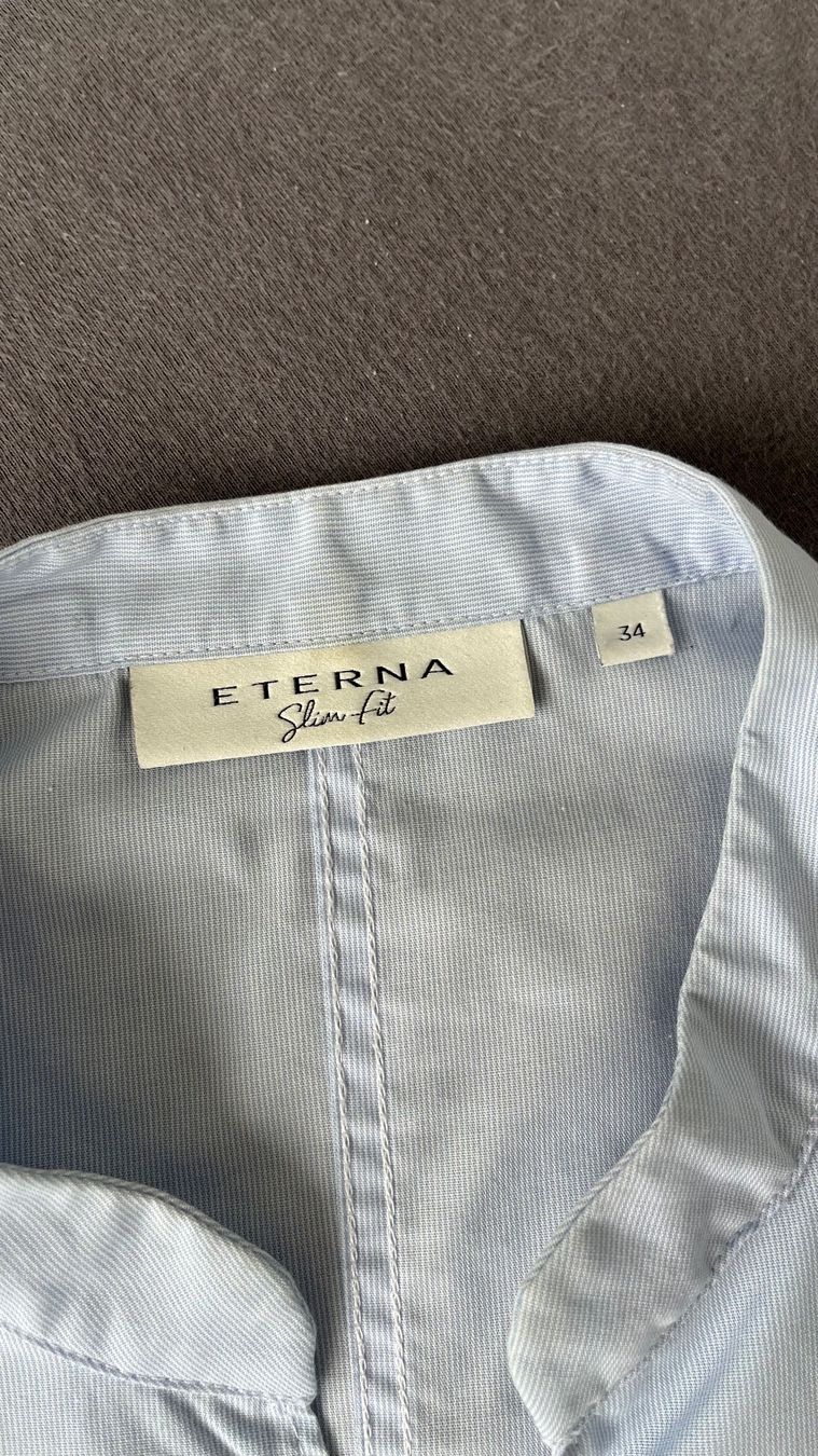 Eterna Camicette: hellblaue Bluse von Eterna / Grösse 34 / kurze Arme – Usato da Zofingen venduto da Klavier777