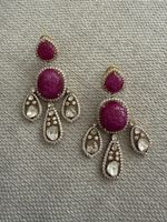 LAST BEFORE MELT Earrings with handcarved Rubys and Diamonds