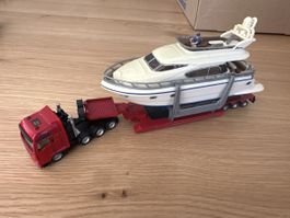 SIKU 1:87 Super - Schwertransport mit Yacht ab 9.-