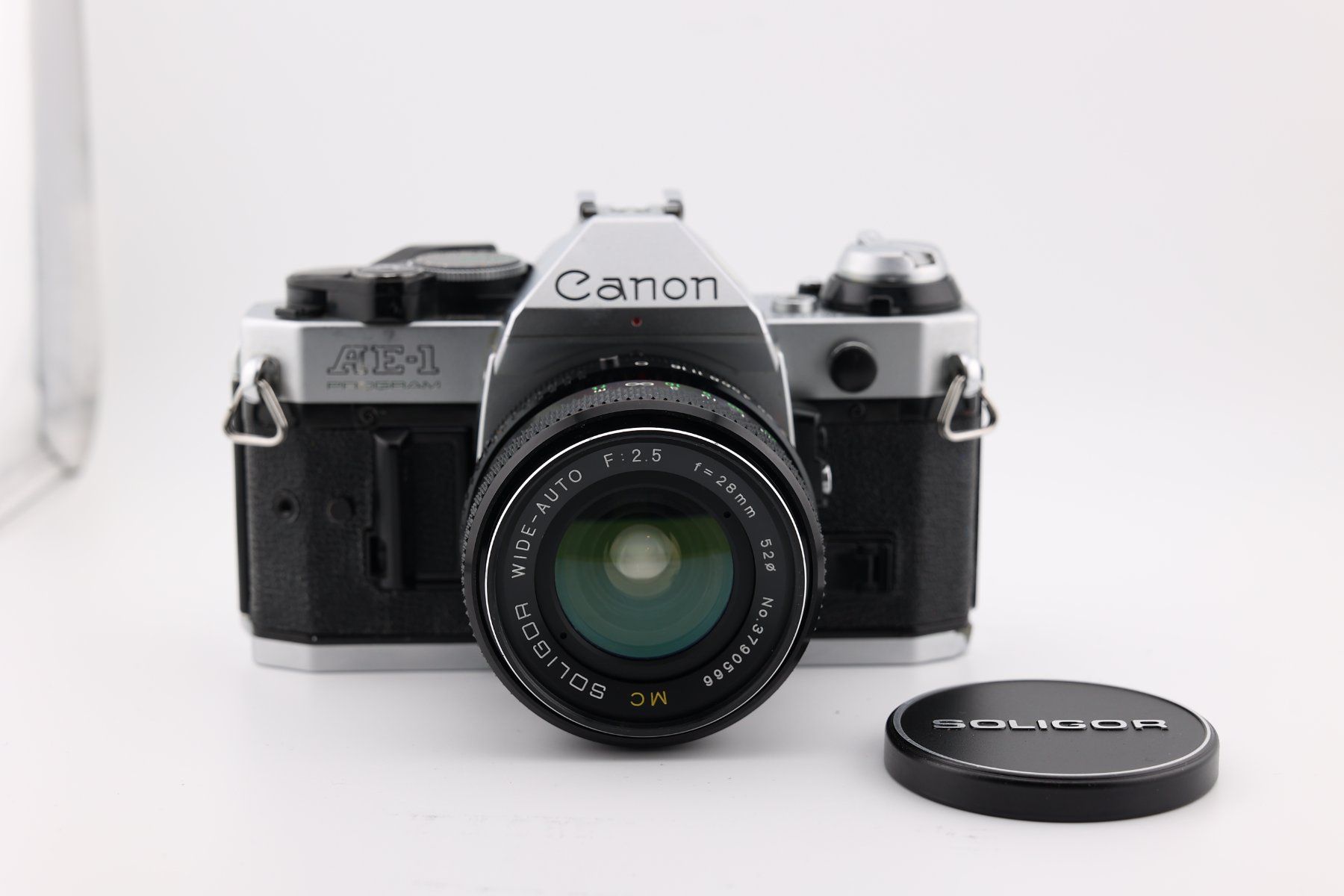 Canon Fotocamera: Canon AE-1 Program analoge Kamera mit 28mm 2.5 Soligor Obj. – Usato da Eichberg venduto da henrikinch 1
