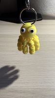 Petit porte-clés en forme de poulpe jaune flexible en 3D 🐙
