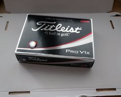 9 Titleist Golf Bälle - NEU