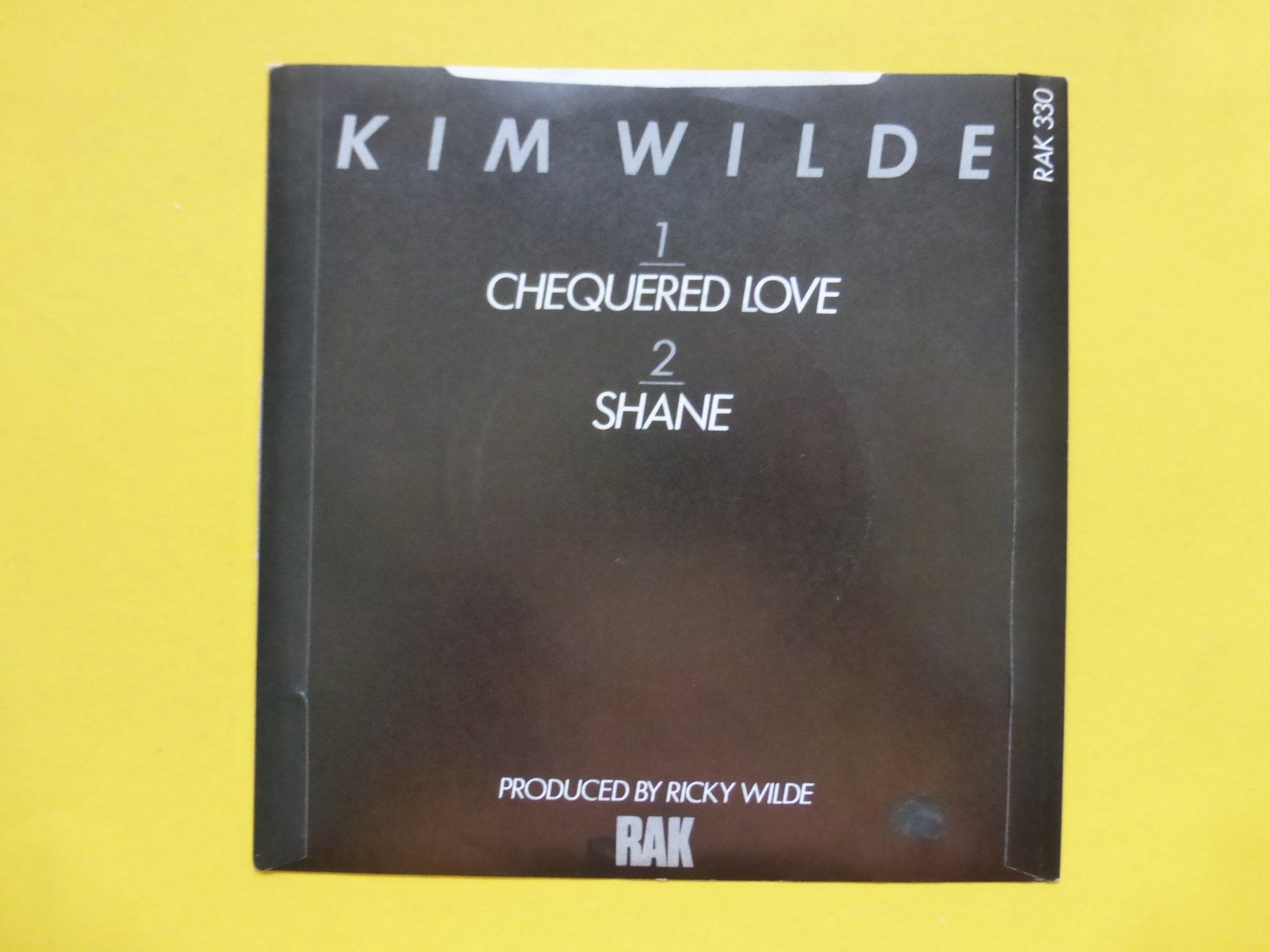 Dischi in vinile: Kim Wilde – Chequered Love – Usato da Zürich venduto da Swiss57 1