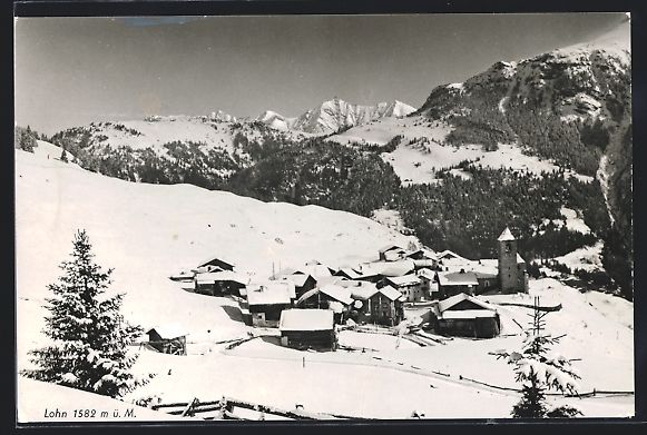 Cartoline postali: AK Lohn /GR, Ortsansicht im Schnee – Usato da Berlin venduto da bartko-reher