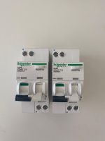 Ce sont 2 disjoncteurs Schneider Electric Acti9 iDD40T C10