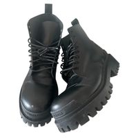 balenciaga leather strike boots
