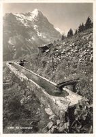 Grindelwald BE Holzbrunnen und Berglandschaft G