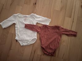 Zwei Baby Bodys langarm weiss und orange Grösse 68