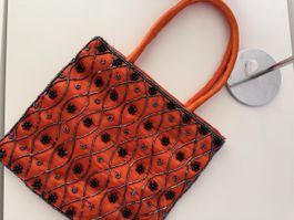 Sac à main orange perlé 