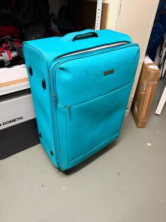 Reisekoffer gross türkis vier Rollen gebrauchter Zustand