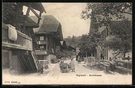 Sigriswil, Strassenpartie mit Gebäudean