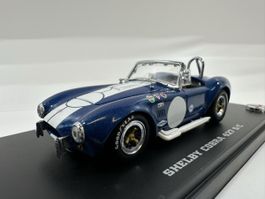 Shelby Cobra 427 S/C 1:43, blau-weiss, inkl.Acrylbox, KYOSHO