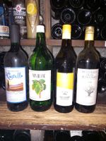 Lot de 4 bouteilles de vins dont 2 ouvertes