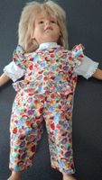Spielzeugpuppe Sigikid blond mit Blumenkleid gebraucht
