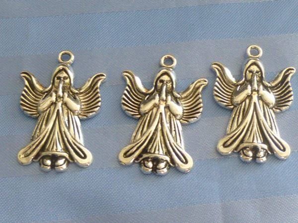 Ciondoli: 12 Anhänger betendes Aengeli Tibetsilber – Nuovo (secondo la descrizione) da Hinwil venduto da Glasperlen