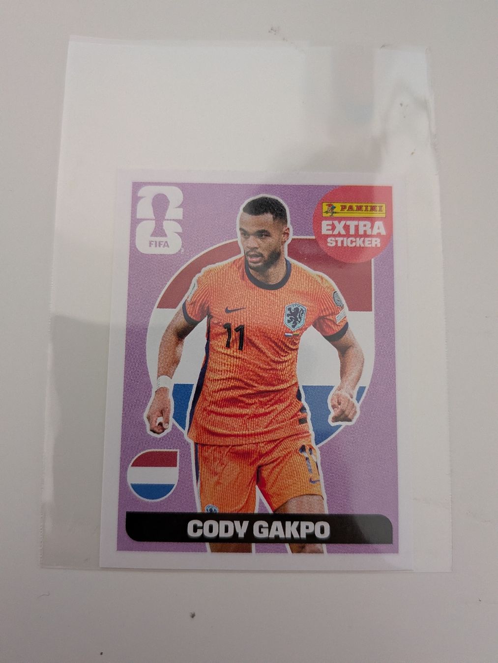 Panini Carte collezionabili: Panini WM 2026 Extra Sticker CODY GAKPO Regular – Nuovo (secondo la descrizione) da Uster venduto da yajiao