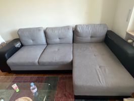 Sectional Sofa Grey fabric with black accents needs repair