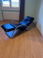 Schöner Leder-Relaxsessel mit Hocker – Vintage