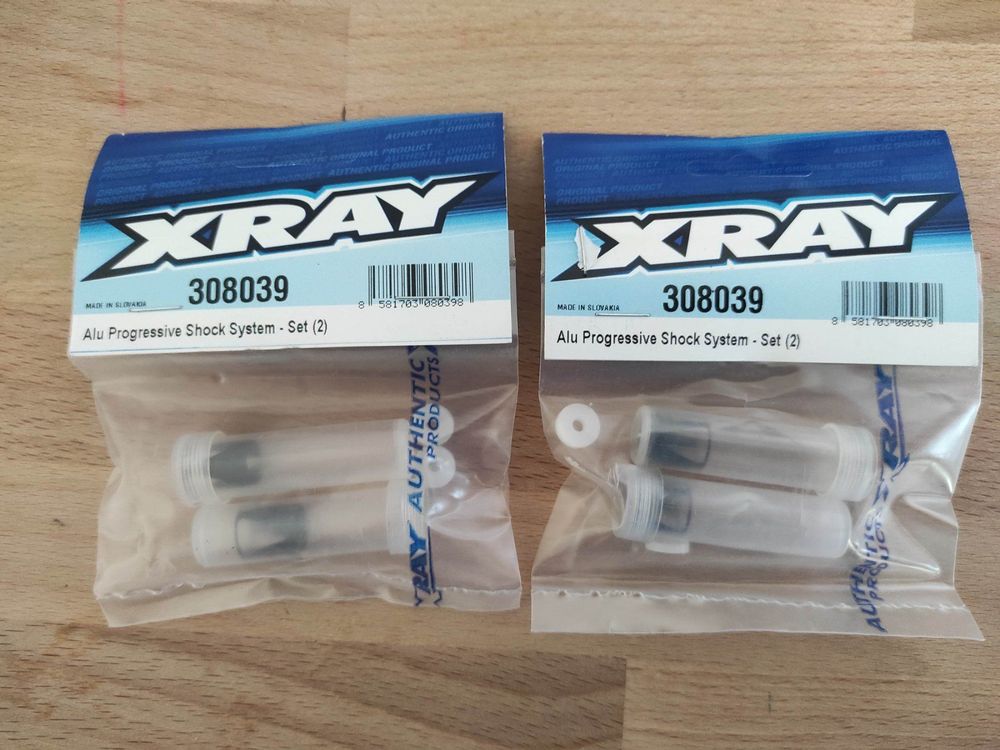 Xray alu progressiv shock system set. 308039 Kaufen auf Ricardo