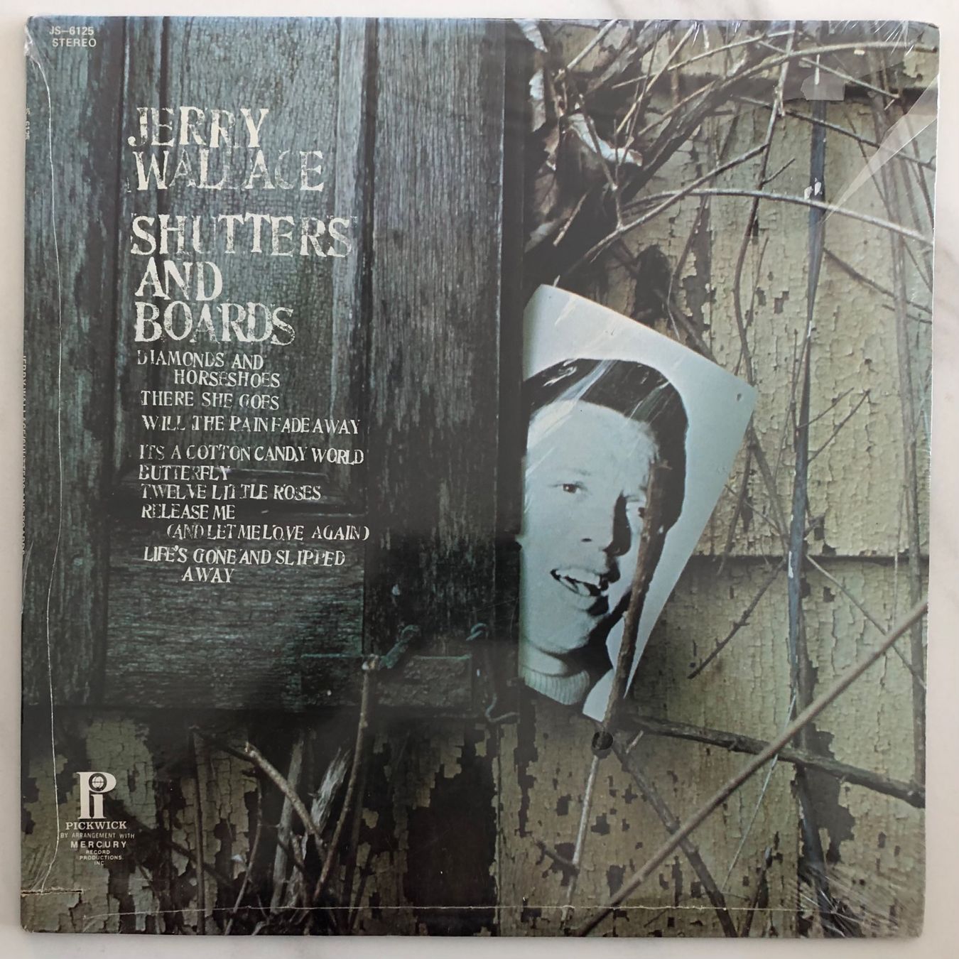 Dischi in vinile: JERRY WALLACE - SHUTTERS AND BOARDS – Nuovo e nell'imballaggio originale da Poliez-Pittet venduto da Newtown-Records