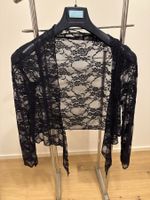 Schwarze Spitzenjacke