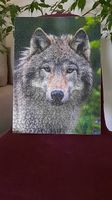 Image loup en puzzle sur support en bois