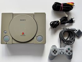 Console Sony PlayStation 1 avec manette et câbles