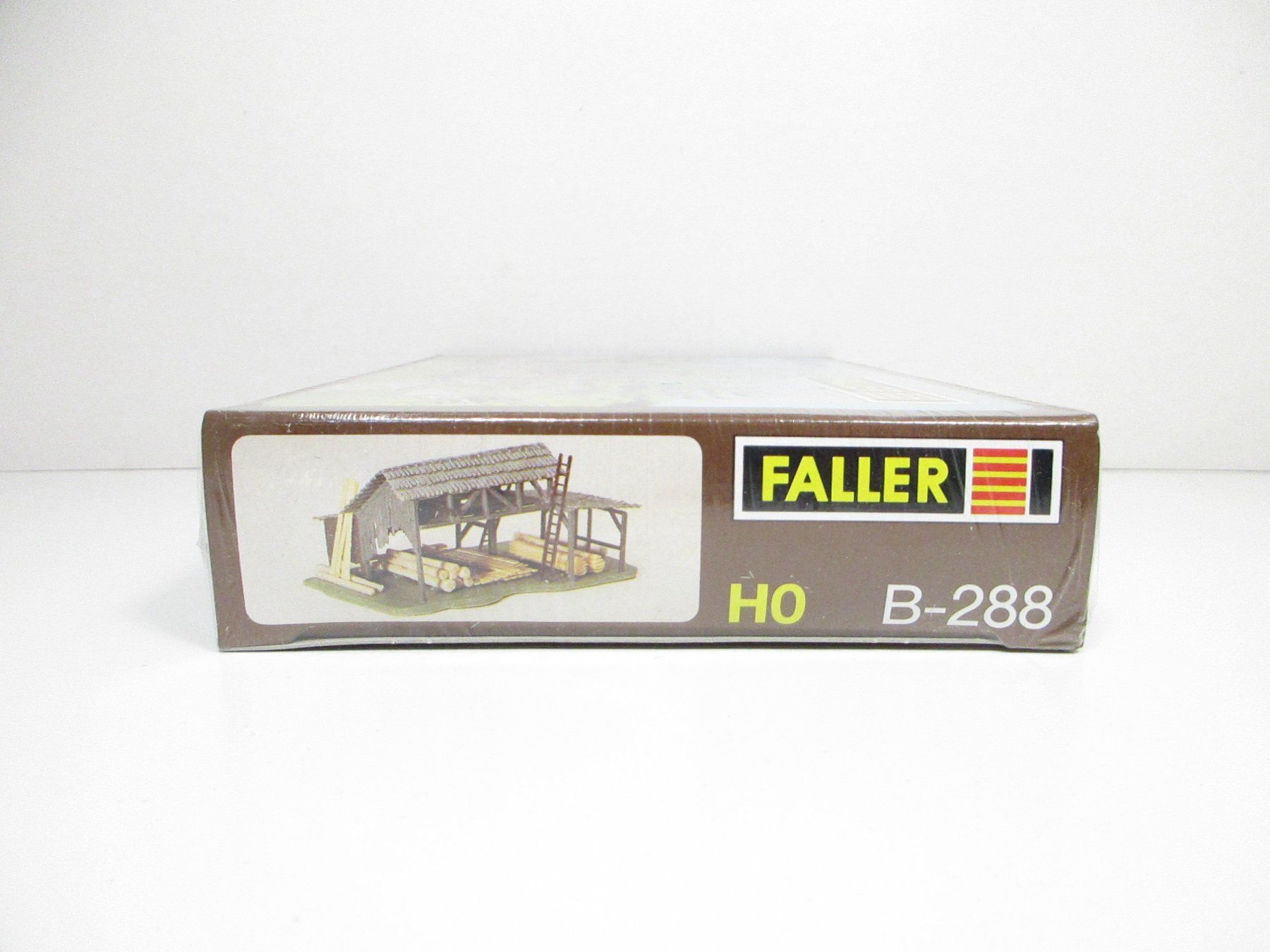 Faller Modellini di ferrovie: Faller H0 B-288 Holzlager – Nuovo e nell'imballaggio originale da Olten venduto da Heinrich875 1