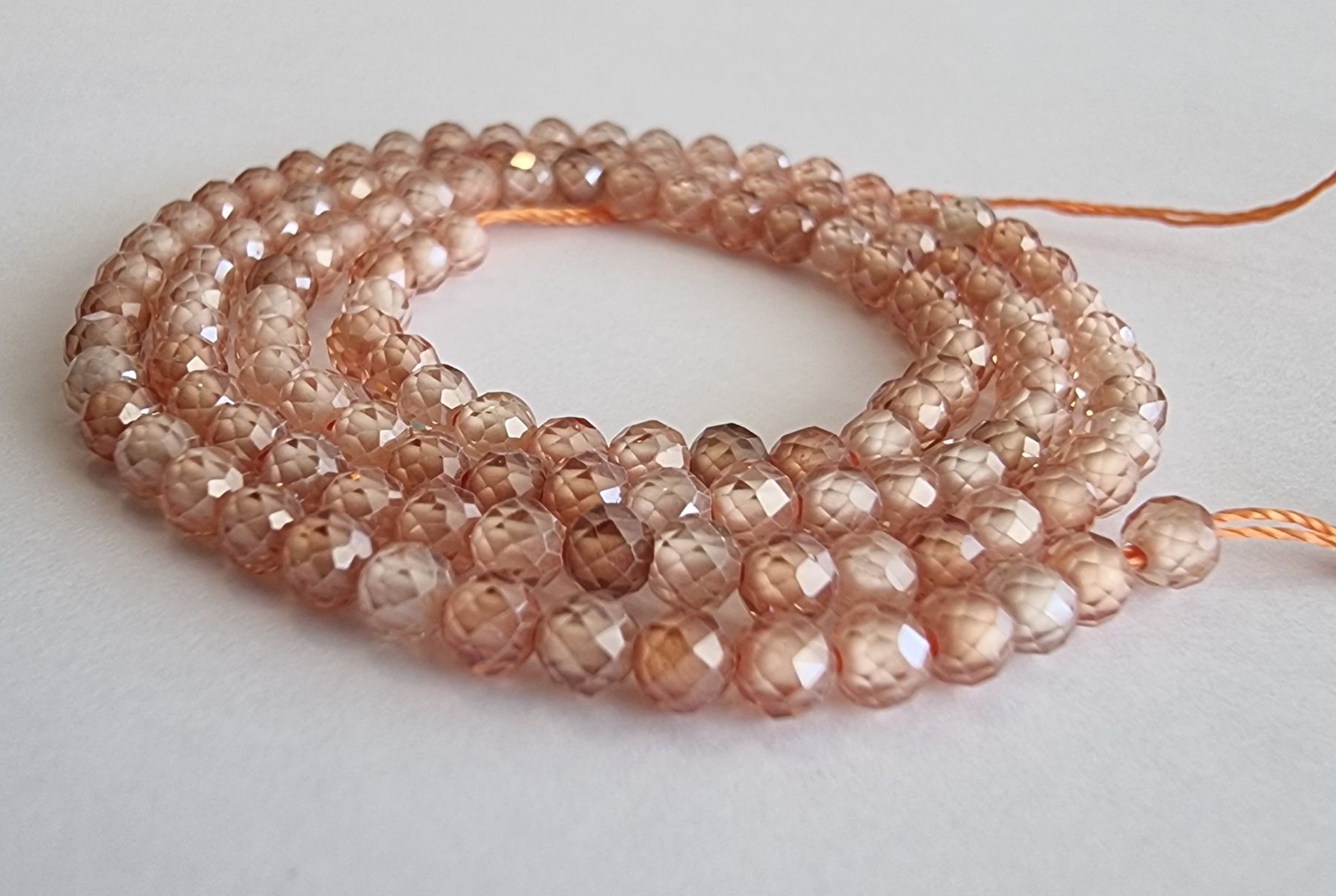 Minerali & Pietre curative: Zirkon Champagne facettiert 3mm. Strang – Nuovo e nell'imballaggio originale da Menziken venduto da Mirager 1