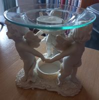 Diffuseur d'huiles essentielles décoratif avec anges.