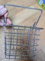 Einkaufskorb und Migros Spielprodukte