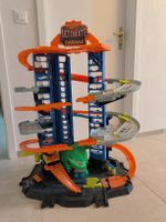 Hot Wheels City Megacity Parkgarage mit T-Rex-Angriff