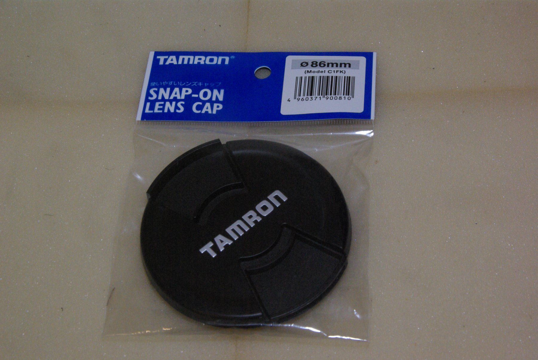 Tamron Obiettivi: TAMRON Kameradeckel, schwarz - 86mm – Nuovo e nell'imballaggio originale da Herisau venduto da Cevianer1844