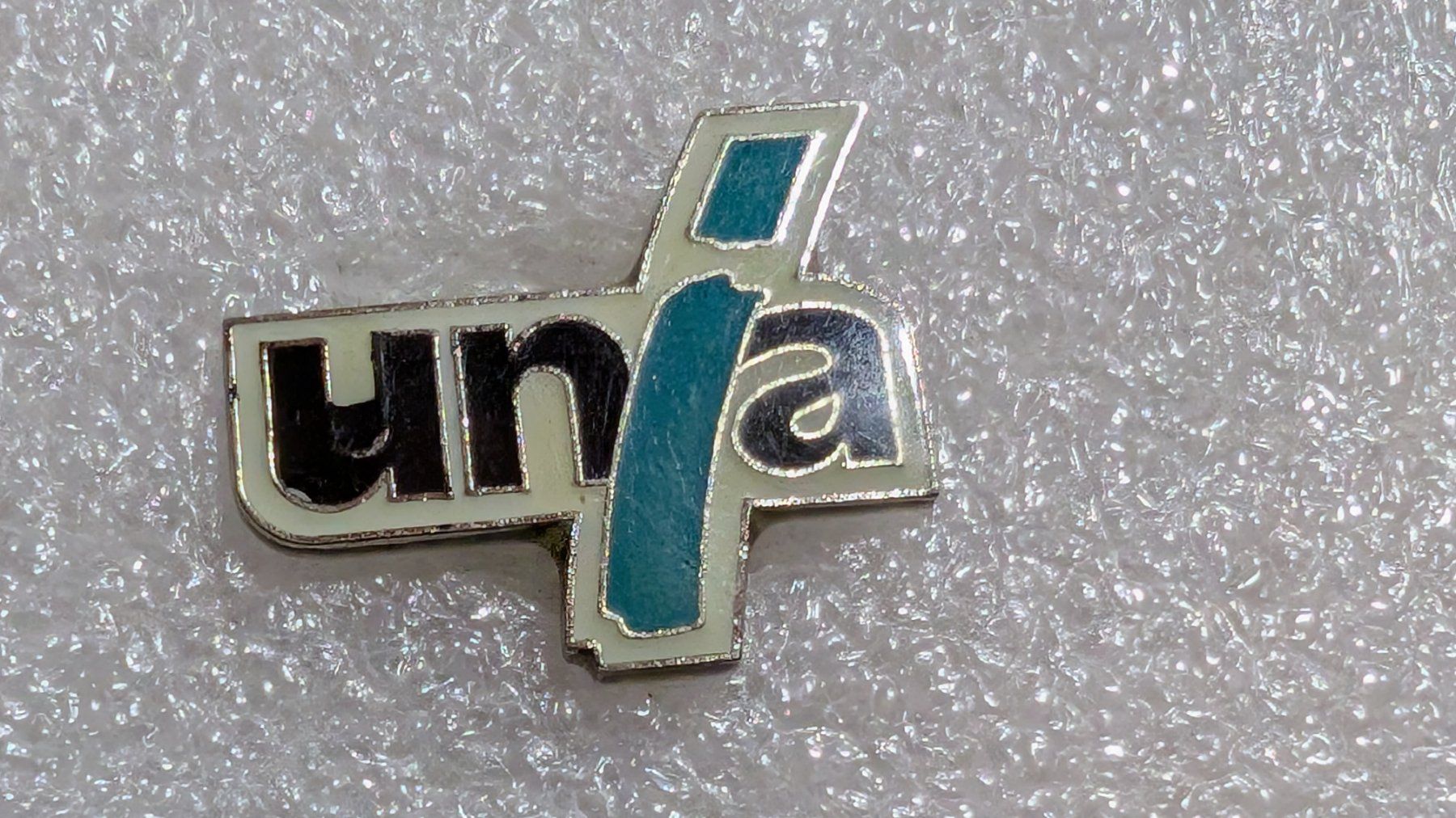 Placchette & Badge: Ansteckpin 271: Unia – Usato da Oppligen venduto da Pin-Fall-Shop