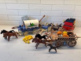 Lot de chariots et accessoires Playmobil western divers